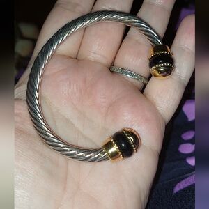 Elegant Gold and Silver Twisted Bracelet